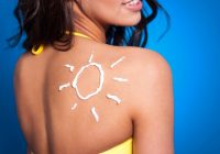 suntan-lotion-woman-s-arm-sun-shape_329181-4424